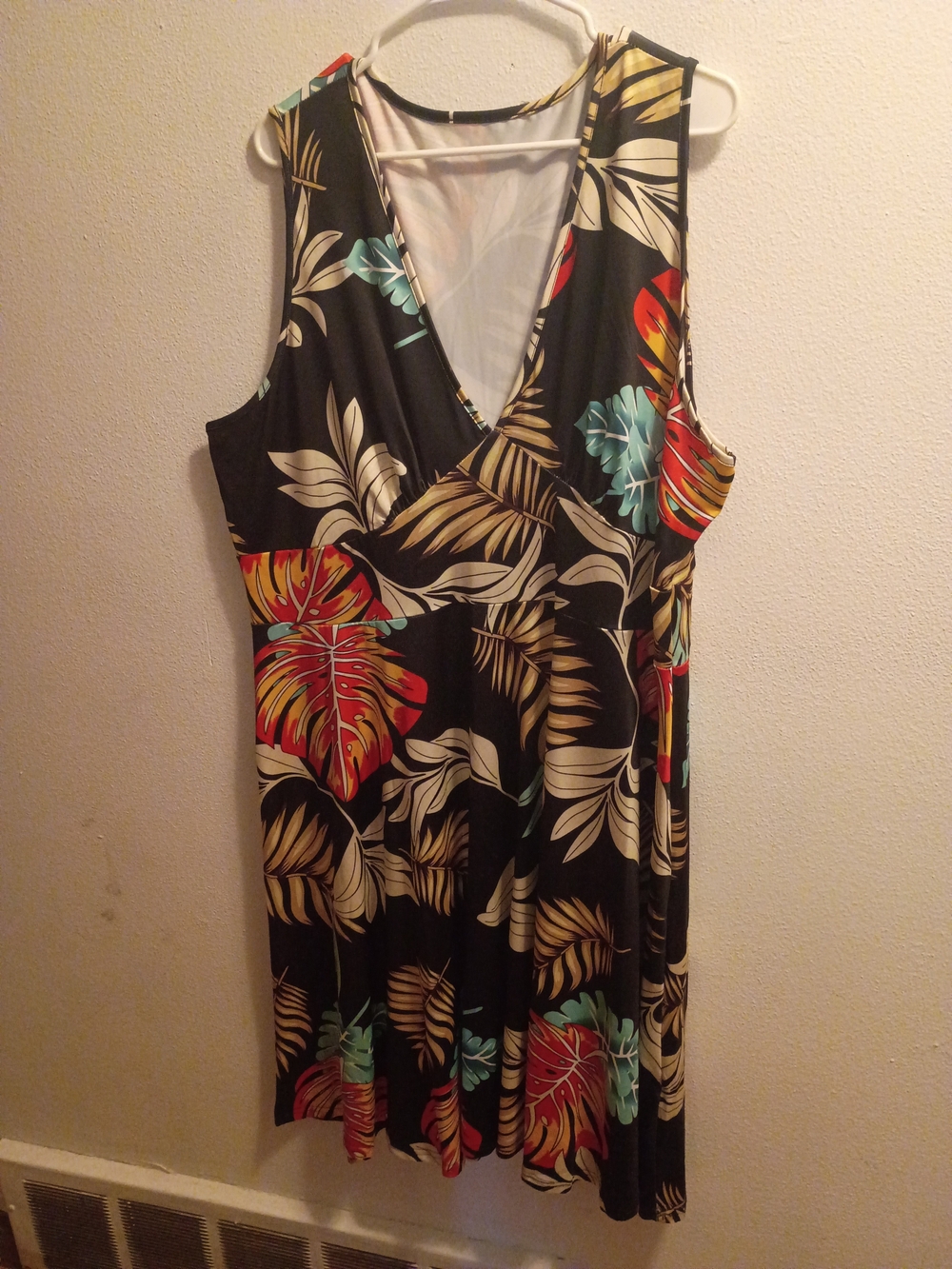 Tropical Sleeveless Faux-Wrap Dress in Black with Multicolor Leaf Print